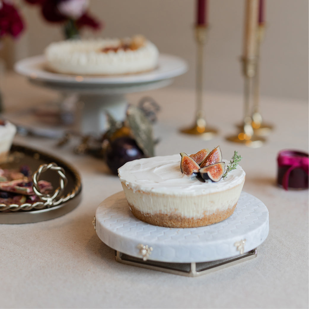 Small Honeyed Fig Cheesecake with Pomegranate Sauce