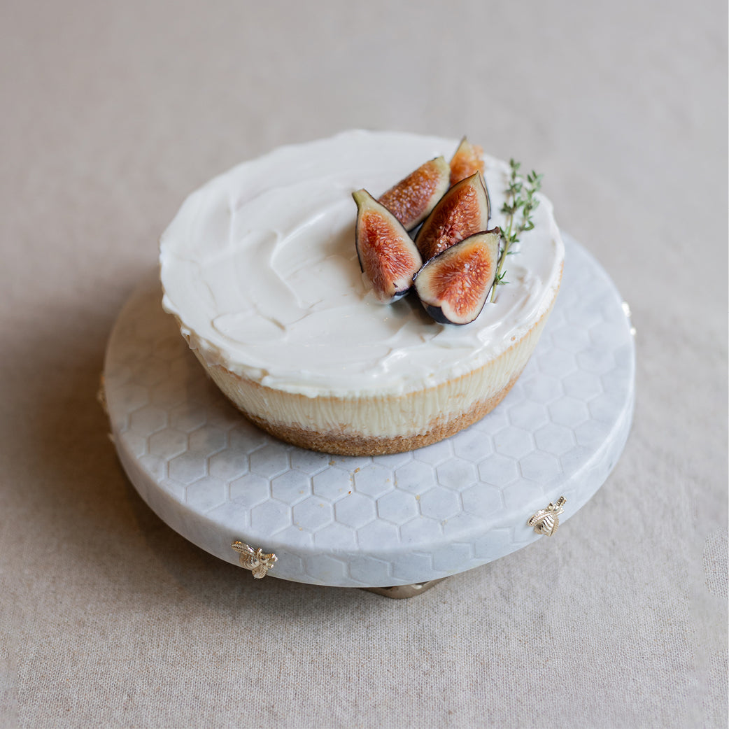Small Honeyed Fig Cheesecake with Pomegranate Sauce