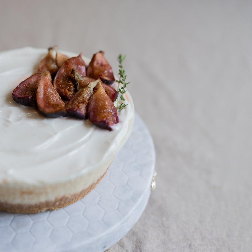 Small Honeyed Fig Cheesecake with Pomegranate Sauce
