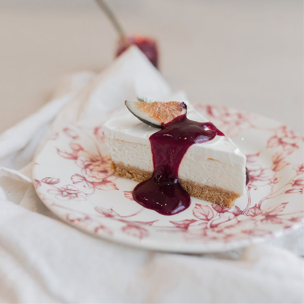 Small Honeyed Fig Cheesecake with Pomegranate Sauce