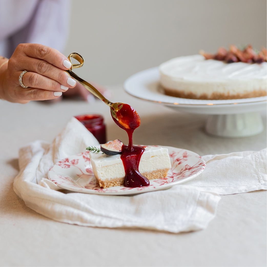 Small Honeyed Fig Cheesecake with Pomegranate Sauce